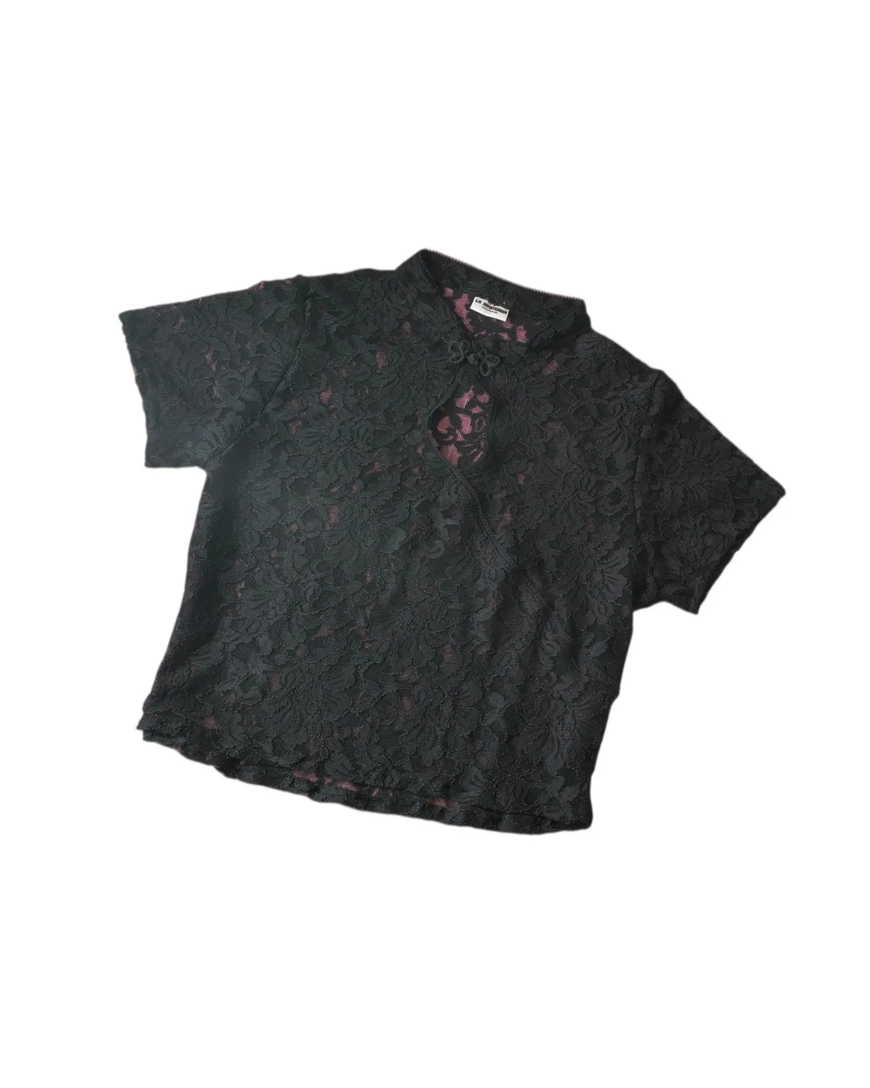 Qipao de encaje negro sobre rosado